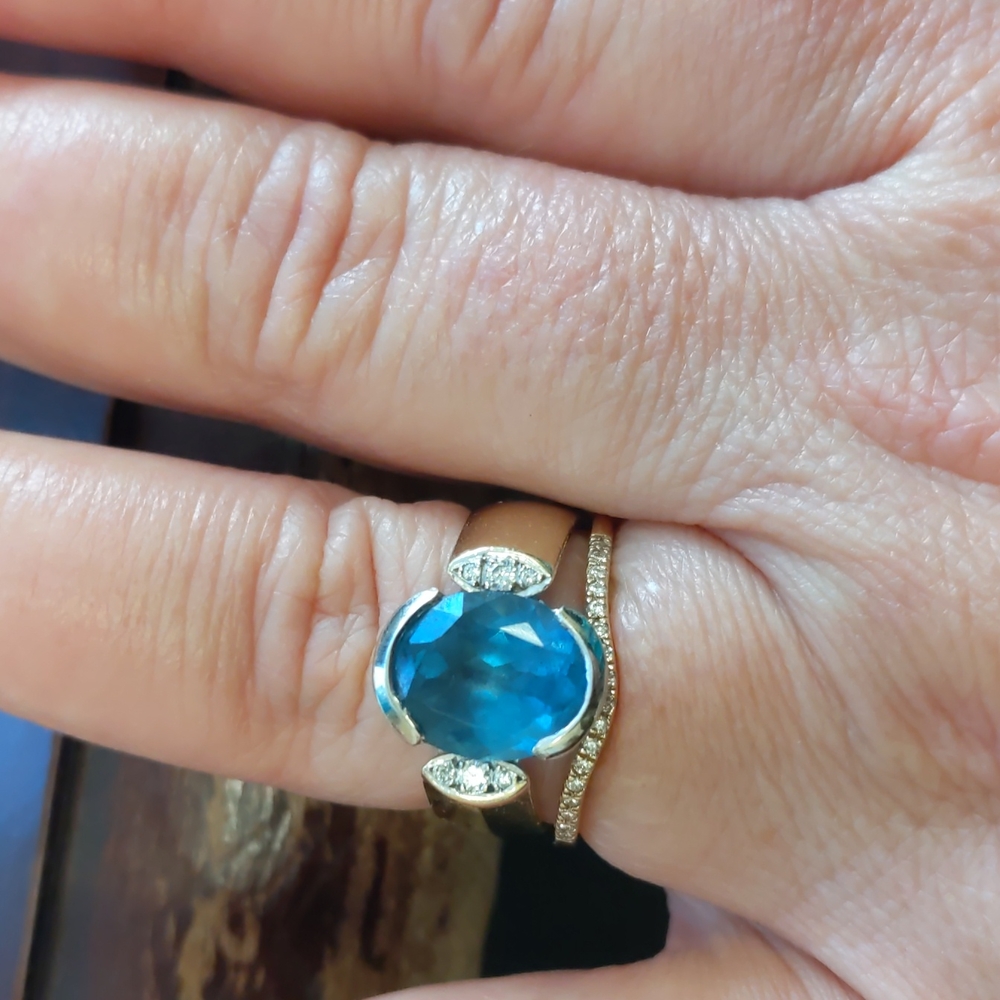 Blue topaz and diamond ring
